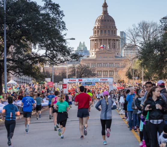 Runners approaching the finish line of the 3M Half Marathon.