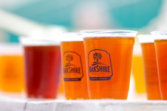 Cups of Oakshire Brewing beer at the Eugene Marathon.
