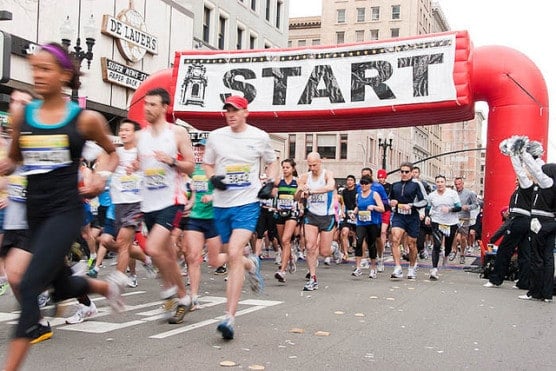 Runners start the Oakland Running Festival in 2010. (Photo by Ella Baker Center/flickr)