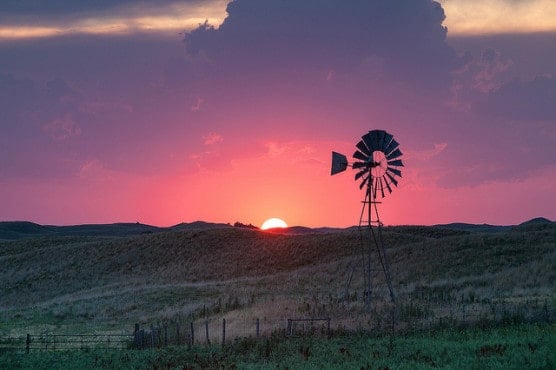 A windmill at sunset in Valentine, Nebraska. (Photo by Kelly DeLay/flickr)
