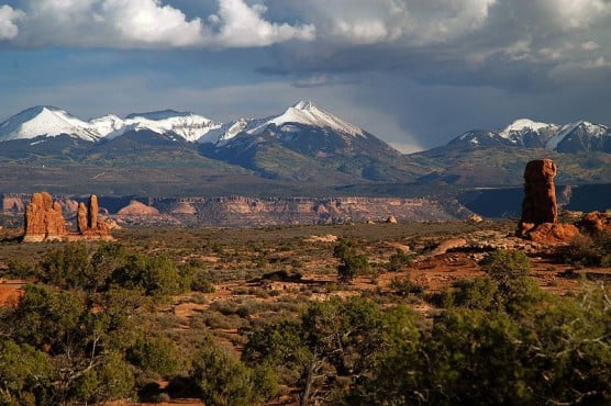 The peaks of the Manti-La Sal National Forest as seen from Utah's Arches National Park. (Photo by Wikimedia)