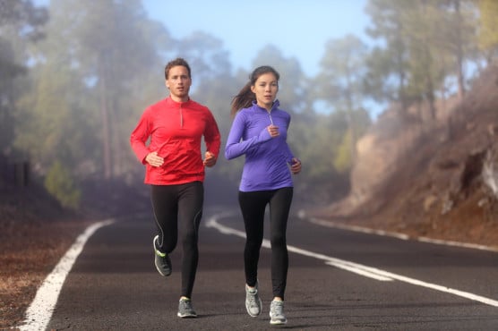 Buddying up is a great way to make the time pass more quickly on long runs. (© Martinmark | Dreamstime.com)