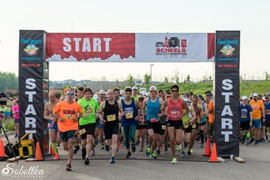 Runners at the start line at the Med City Half Marathon