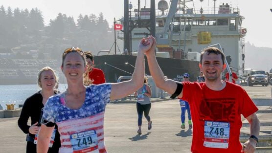 Runners on the course at the Newport Celebration Run Half Marathon in Newport, Oregon.