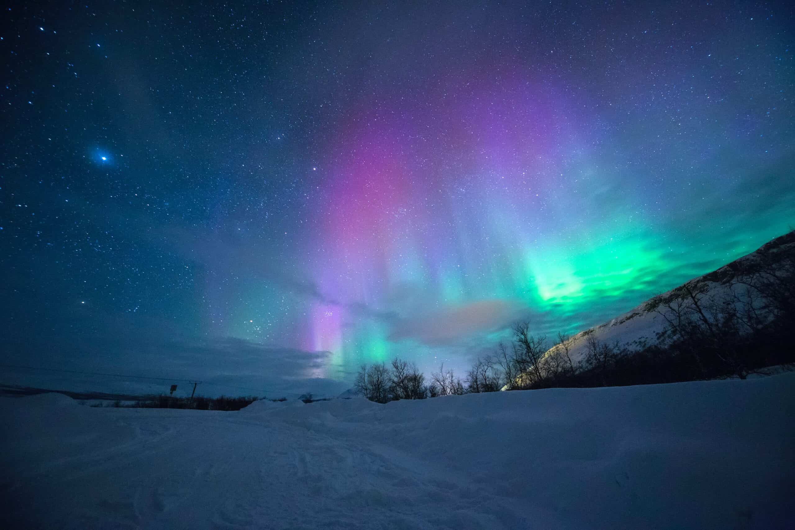 The Northern Lights seen from the Midnight Sun Marathon in Tromso, Norway.