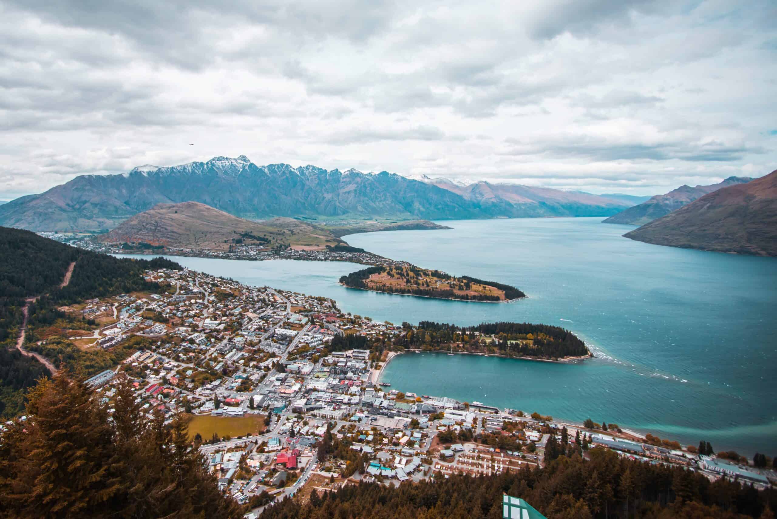 Queenstown Marathon in New Zealand scenic view of the coastal cityscape.