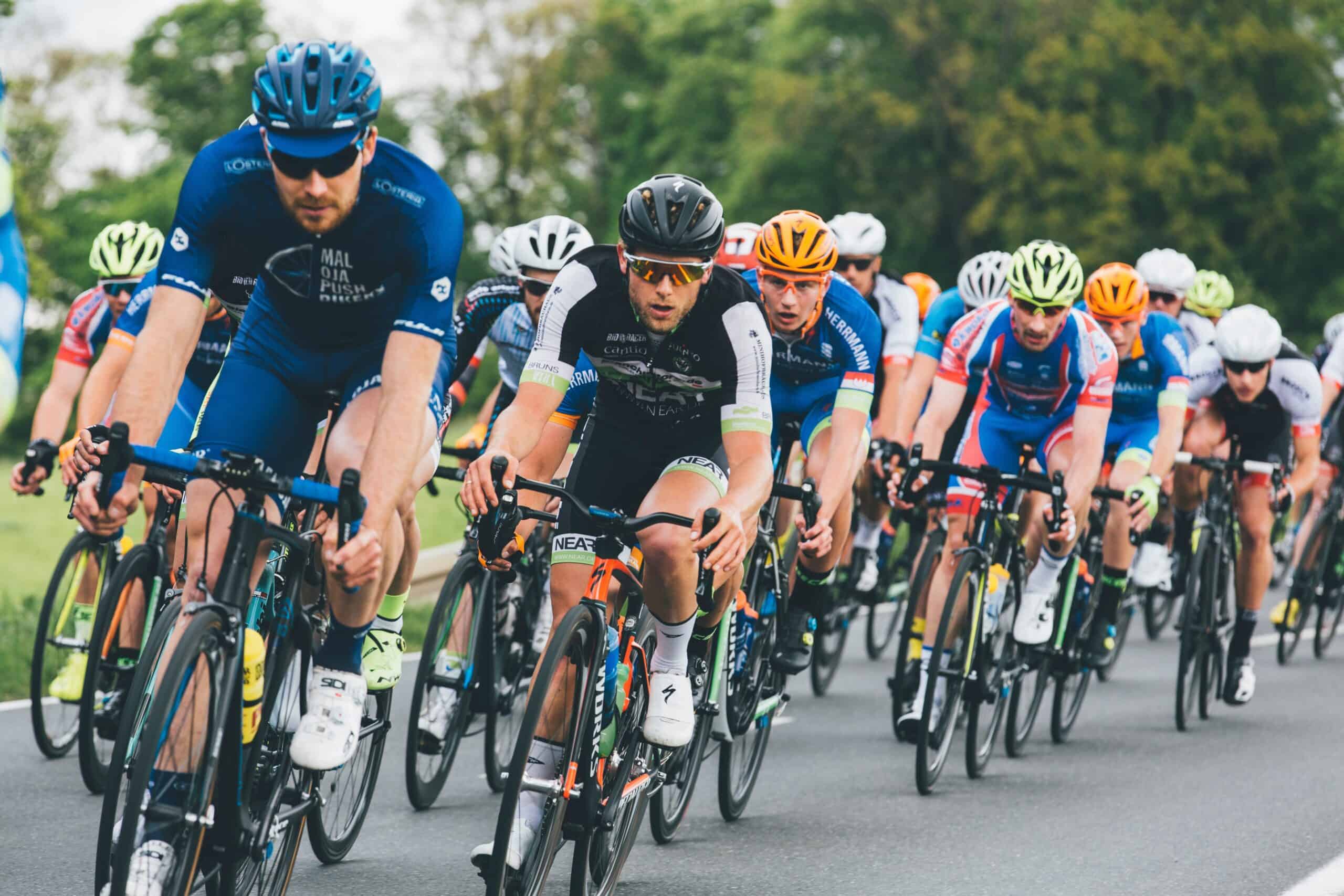 A peloton of cyclists who are cross-training for running heart rate zones.