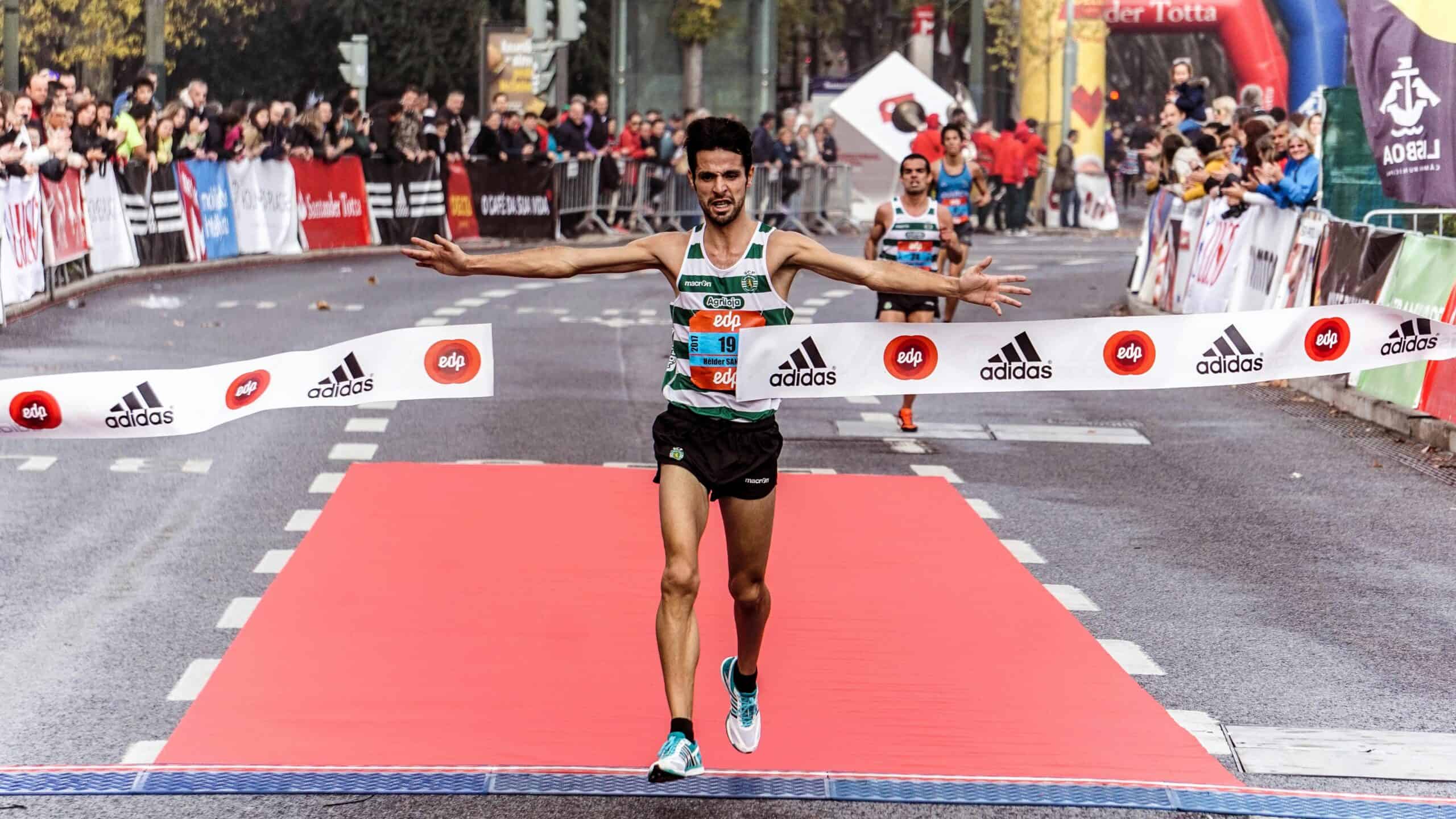Marathon runner crossing the finish line after training