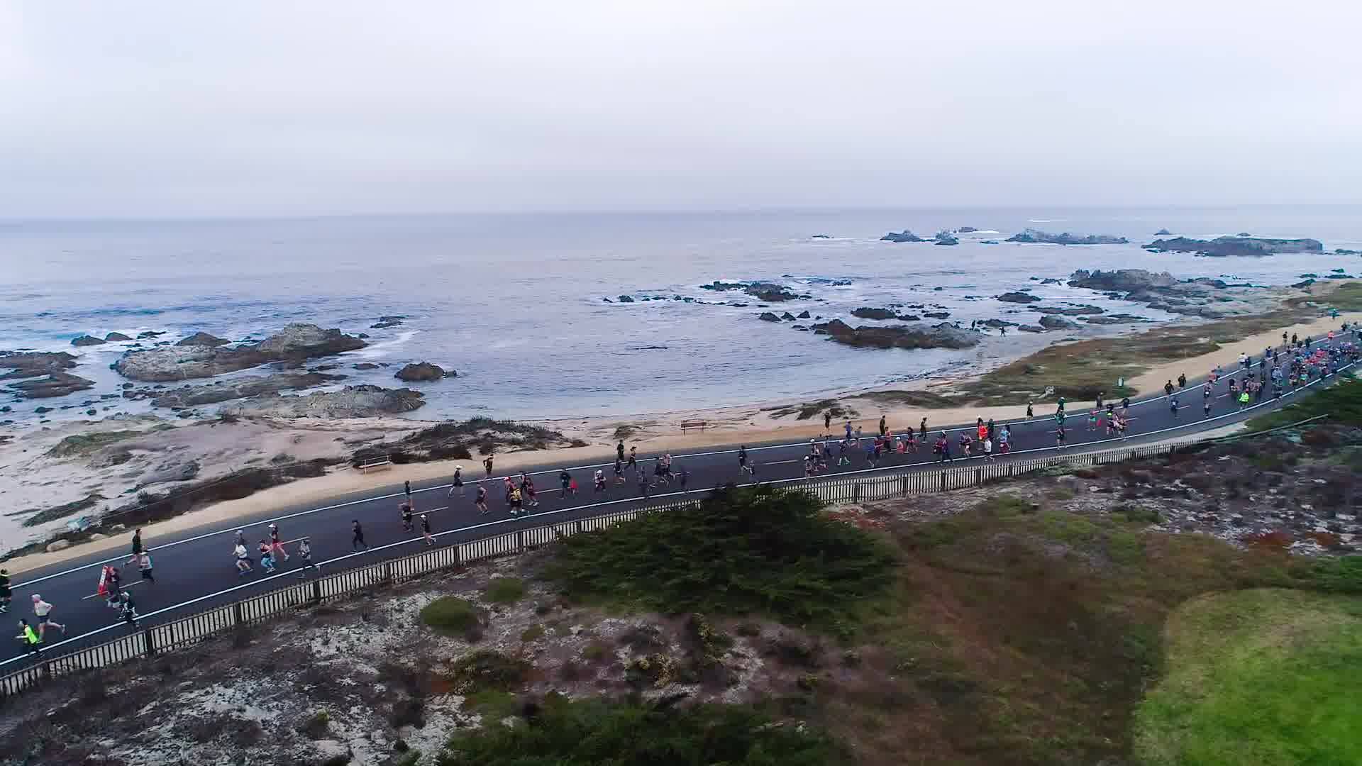 runners along the coast in the Monterey Bay Half Marathon